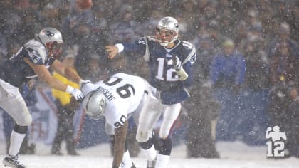 Tom Brady passes against the Raiders in the 2001 AFC Divisional Playoff Game also known as the "Snow Bowl".