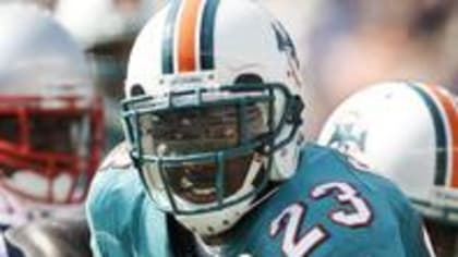 Ronnie Brown of the Miami Dolphins warms up before The Baltimore