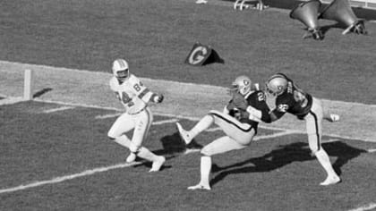 Defensive back Neal Colzie of the Oakland Raiders stops