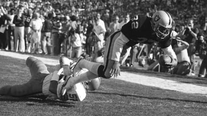 Terry Bradshaw, who quarterbacked the Pittsburgh Steelers to a 24-13  victory over the Oakland Raiders in the AFC championship game in Oakland,  Dec. 29, 1974, answers a question in the dressing room