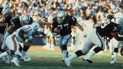 Los Angeles Raiders' veteran running back Frank Hawkins (27) heads