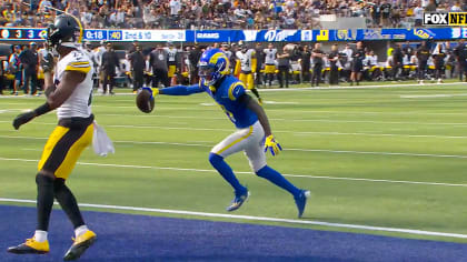 Los Angeles Rams quarterback Matthew Stafford connects with wide receiver  Tutu Atwell downfield for a 31-yard touchdown