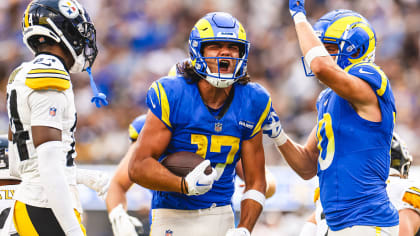 Los Angeles Rams quarterback Matthew Stafford connects with wide receiver  Tutu Atwell downfield for a 31-yard touchdown