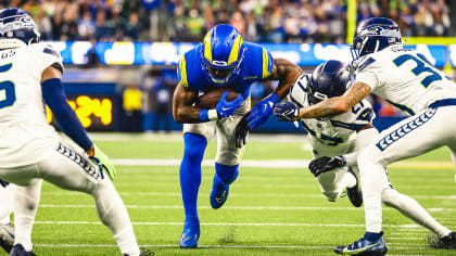 Brandon Powell of the Los Angeles Rams runs with the ball as