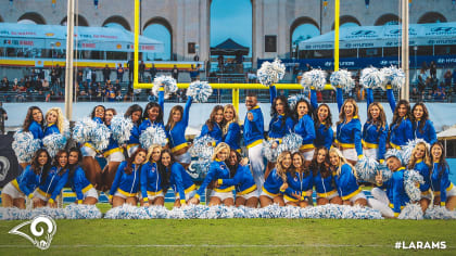 Los Angeles Rams cheerleaders pose with a child during - NARA & DVIDS  Public Domain Archive Public Domain Search