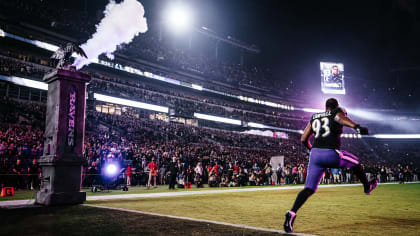 Baltimore Ravens defensive end Calais Campbell (93) walks on the field  before the start of an NFL football game against the Miami Dolphins,  Thursday Nov. 11, 2021, in Miami Gardens, Fla. (AP