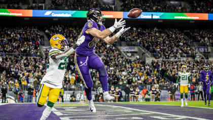 BALTIMORE, MD - DECEMBER 19: The Packers offense celebrates in a huddle  after a touchdown during the Green Bay Packers versus Baltimore Ravens NFL  game at M&T Bank Stadium on December 19