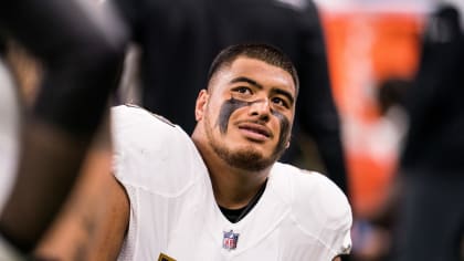 Baltimore Ravens offensive tackle Daniel Faalele takes the field