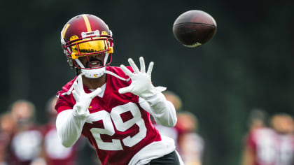 Washington Commanders cornerback Christian Holmes (34) runs a drill during  an NFL football practice at FedEx Field, Saturday, Aug. 6, 2022, in  Landover, Md. (AP Photo/Alex Brandon Stock Photo - Alamy