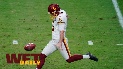 Washington Commanders punter Tress Way (5) makes his way to the field  before practice at the team's NFL football training facility, Tuesday, Aug.  2, 2022 in Ashburn, Va. (AP Photo/Nick Wass Stock