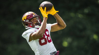 Washington Commanders tight end Armani Rogers (88) wears Crucial