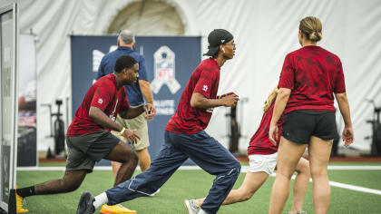 Military members participate in USAA and WFT's Salute to Service NFL Boot  Camp