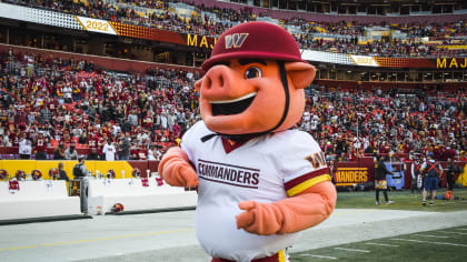 The Washington Commanders mascot Major Tuddy walks on the sidelines before  an NFL football game between the Commanders and the Dallas Cowboys, Sunday,  Jan. 8, 2023, in Landover, Md. (AP Photo/Nick Wass