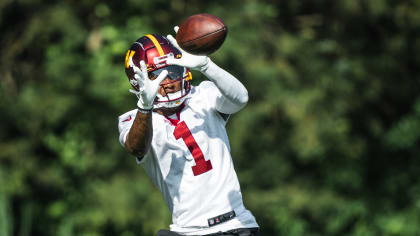 Washington Commanders wide receiver Dyami Brown runs with the ball during a  NFL football practice at the team's training facility, Thursday, July 27,  2023, in Ashburn, Va. (AP Photo/Alex Brandon Stock Photo 