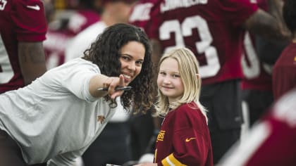 Redskins fans known as the 'Hogfarmers' help youth