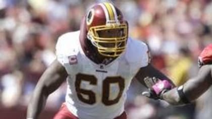 Washington Redskins' Chris Samuels (60) is all smiles after the Redskins  defeated the Dallas Cowboys 35-7, at FedEx Field in Washington on December  18, 2005. (UPI Photo/Kevin Dietsch Stock Photo - Alamy