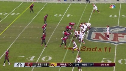 Washington Football Team quarterback Taylor Heinicke (4) dives