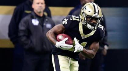 New Orleans Saints wide receiver Tommylee Lewis (87) returns a punt 57  yards before Carolina Panthers punter Andy Lee (8) can trip him up at the  Mercedes-Benz Superdome in New Orleans October