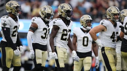 Jeremy Shockey of the New Orleans Saints walks to the sidelines in