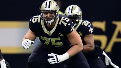 Tampa, Florida, USA. 09th Dec, 2018. New Orleans Saints offensive guard  Andrus Peat (75), New Orleans Saints center Max Unger (60) and New Orleans  Saints offensive guard Larry Warford (67) during the