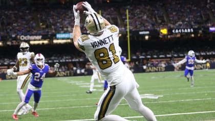 New Orleans Saints tight end Adam Trautman (82) wears a Salute to Service  towel during an NFL football game against the Los Angeles Rams, Sunday,  Nov. 20, 2022, in New Orleans. (AP