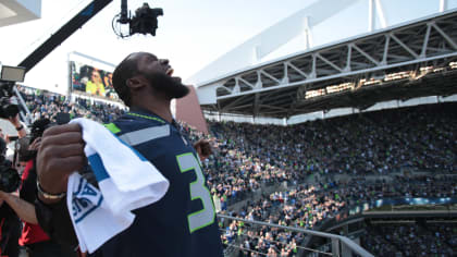 Nelson Cruz Raises 12th Man Flag at Seahawks Game, by Mariners PR