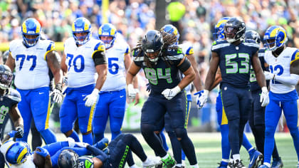 Seattle Seahawks including Thomas Rawls (34) and Cassius Marsh wear the NFL  color rush uniforms before an NFL football game against the Los Angeles  Rams, Thursday, Dec. 15, 2016, in Seattle. (AP