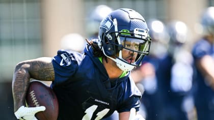 K.J. Wright has knee surgery, status for Seattle's opener unknown