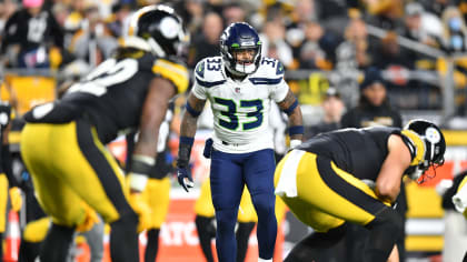 Fans wear Seattle Seahawks head gear as they watch warmups before an NFL  football game between the Pittsburgh Steelers and the Seattle Seahawks,  Sunday, Oct. 17, 2021, in Pittsburgh. (AP Photo/Fred Vuich