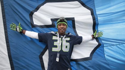 PHOTOS: Seahawks Legend Ricky Watters Raises 12 Flag For Week 1