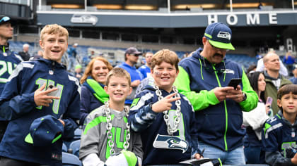 12s celebrate playoff-bound Seahawks after winning at Lumen Field Sunday