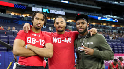 Seattle Seahawks wide receiver Jaxon Smith-Njigba (11) stands with  teammates including tight end Will Dissly (89) and tight end Colby  Parkinson (84) May 22, 2023, at the team's NFL football training facility