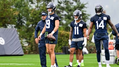 Seattle Seahawks wide receiver Jaxon Smith-Njigba (11) stands with  teammates including tight end Will Dissly (89) and tight end Colby  Parkinson (84) May 22, 2023, at the team's NFL football training facility