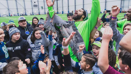 Michael Bennett takes victory lap on police bike after Seattle