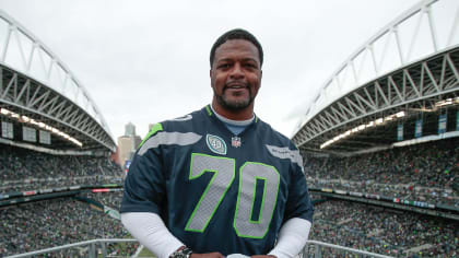 PHOTOS: Seahawks Legend Ricky Watters Raises 12 Flag For Week 1