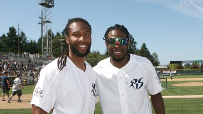 Seattle Seahawks' Richard Sherman, left, greets Arizona Cardinals' Larry  Fitzgerald after an NFL football game Sunday, Dec. 31, 2017, in Seattle.  Arizona won 26-24. (AP Photo/Elaine Thompson Stock Photo - Alamy