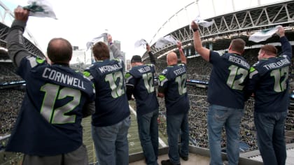 Nelson Cruz Raises 12th Man Flag at Seahawks Game, by Mariners PR