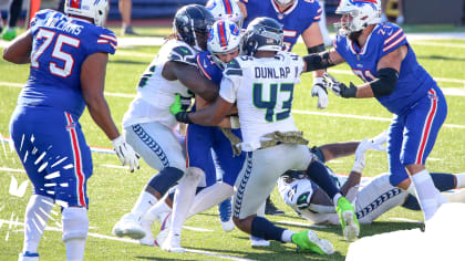 Seattle Seahawks wide receiver DK Metcalf (14) runs a pass route against  the Buffalo Bills during the first half of an NFL football game, Sunday,  Nov. 8, 2020, in Orchard Park, N.Y. (