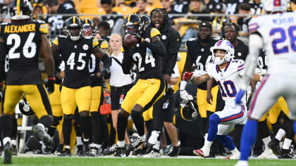 Pittsburgh Steelers running back Rashard Mendenhall(34) is tackled by  Cleveland Browns safety T.J. Ward(43)