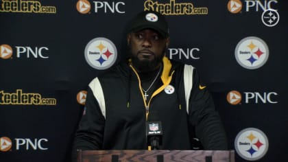 Pittsburgh Steelers head coach Mike Tomlin watches the scoreboard clock  before calling a timeout in the final minute the fourth quarter of the  19-16 Steelers win over the Buffalo Bills at Heinz