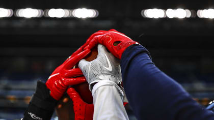 Houston Texans' Adedayo Odeleye (75) stretches during an NFL