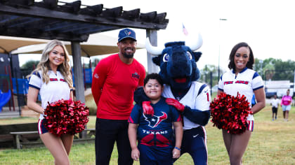 Houston Texans players take part in book drive, equipment donations