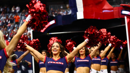 HOUSTON, TX - NOVEMBER 20: Houston Texans Cheerleaders rev up the crowd  during the football game bet