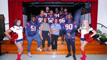 Houston Texans players take part in book drive, equipment donations