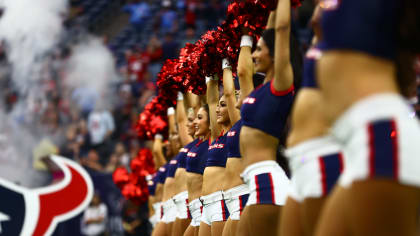 Houston Texans fans cheer in the stands during the second half of