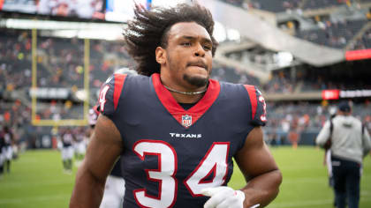 Houston Texans defensive end Troy Hairston (34) warms up against