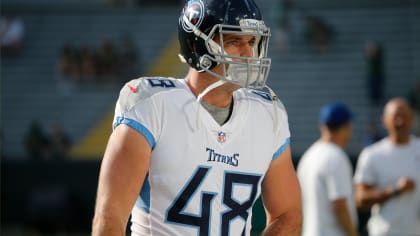 Tennessee Titans long snapper Beau Brinkley walks to a drill