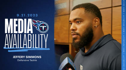 Tennessee Titans defensive tackle Jeffery Simmons (98) and linebacker  Rashad Weaver (99) talk before play starts