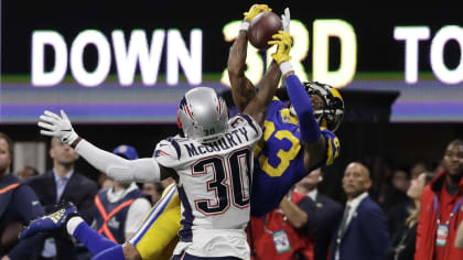 McCourty twins' mom debuting split Patriots-Dolphins shirt for