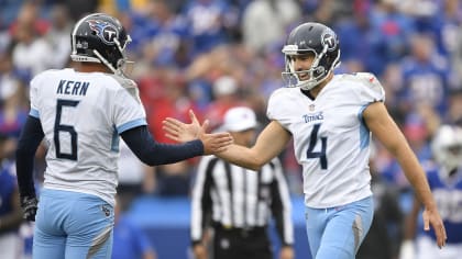 Tennessee Titans holder Brett Kern (6) signals good as kicker Ryan Succop  (4) smiles after Succop kicked a 50 yard field goal to go ahead of the San  Francisco 49ers with one